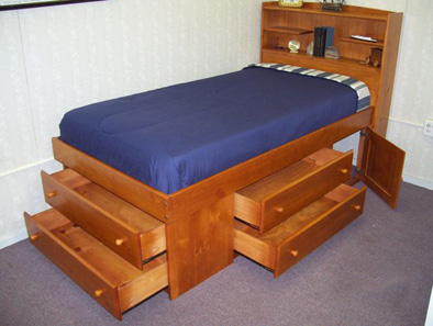 Underbed wood drawers on a sturdy Euro roller system.