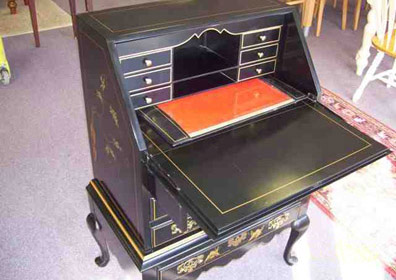 This vintage desk with pull down writing panel is an example of the fine decorative pieces of furniture you can buy at Finders Keepers in CT